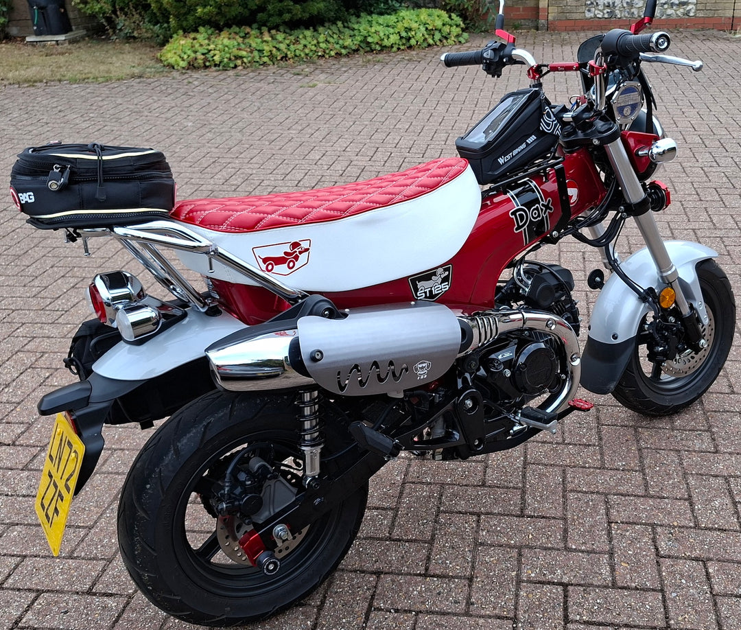 Red Honda Dax 125 with Red Diamond Seat cover with Dax dog embroidery - handmade by Cheeky Seats 